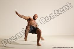 Underwear Gymnastic poses Man Black Muscular Bald Dancing Dynamic poses Academic